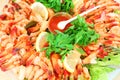 Many red shrimps, slices of lemon, herbs and Royalty Free Stock Photo