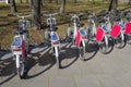 Many rental city bikes standing in a row