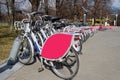 Many rental city bikes standing in a row