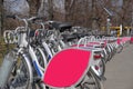 Many rental city bikes standing in a row