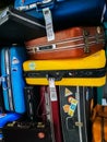 Many of retro vintage old baggages and luggages stacked together