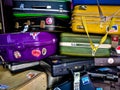 Many of retro vintage old baggages and luggages stacked together