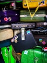 Many of retro vintage old baggages and luggages stacked together