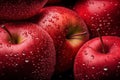 Many ripe juicy red apples covered with water drops as background Royalty Free Stock Photo