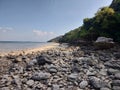 Many rock beside the beach after low tide