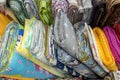 many rolls of colored fabric with different patterns Royalty Free Stock Photo