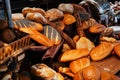 Many rolls of different breads in the bakery restaurant Royalty Free Stock Photo