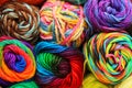 Many Rolls of Multi colored yarn in rows macro photograph