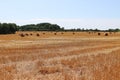 Landscape with a stubble field with straw bales Royalty Free Stock Photo