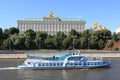 Moscow, Russia Ã¢â¬â June 13, 2018: River pleasure boat, Kremlin Embankment, Grand Kremlin Palace and domes of Kremlin Cathedrals.