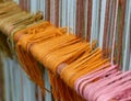 Many row of colored wool thesis in old textiles weaving loom