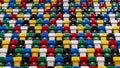 Many rows of bright colorful plastic seats, grandstand stadium