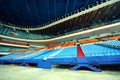 Many rows of empty plastic seats of grandstand Royalty Free Stock Photo