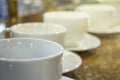 Many rows of white coffee cup on table Royalty Free Stock Photo