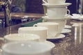 Many rows of white coffee cup on table Royalty Free Stock Photo