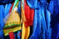 Sacred hadags or khadags blue silk scarves and prayer flags close-up, Mongolia