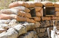 many Sandbags of a trench dug in the ground to defend army soldiers from enemy raids