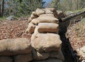 many Sandbags of a trench dug in the ground to defend army soldiers from enemy raids