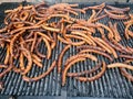 many sausages on the grill Royalty Free Stock Photo