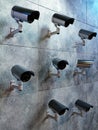 Many security cameras mounted to the wall monitoring the area Royalty Free Stock Photo