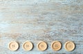 Many sewing buttons on wooden background, flat lay. Space for text