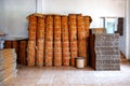 Many sheaves, bundles tied long sticks of cinnamon collected for shipping in the factory