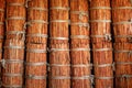 Many sheaves, bundles tied long sticks of cinnamon collected for shipping in the factory