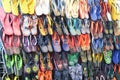 Many shoes put on the stall of the night street shoe store