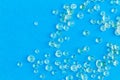 Many silica gel on blue background Royalty Free Stock Photo