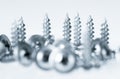 Many silver screws toned grey Royalty Free Stock Photo