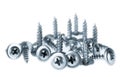 Many silver screws toned grey Royalty Free Stock Photo
