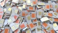 Many SIM cards with Orange S.A. logo, close-up. Editorial telecommunication related 3D rendering