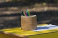 Many simple pencils in the pencil case on a wooden table Royalty Free Stock Photo