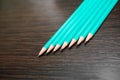 Many simple turquoise pencils Royalty Free Stock Photo
