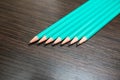 Many simple turquoise pencils Royalty Free Stock Photo