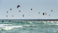 Many sky surfers train in stormy waters Royalty Free Stock Photo