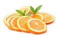 Many sliced oranges and green plant isolated Royalty Free Stock Photo