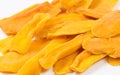 Many slices of dried mango close-up.