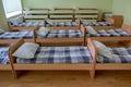 Many small beds in daycare preeschool empty bedroom Royalty Free Stock Photo