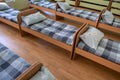 Many small beds in daycare preeschool empty bedroom Royalty Free Stock Photo