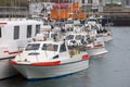 Many small fishermen boats at the dock in Hofn city, Iceland