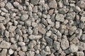 Many small grayish stones