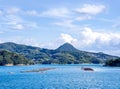 Many small islands over the blue ocean in sunny day, famous Kujukushima99 islands pearl sea resort islet in Sasebo Saikai