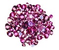 Many small ruby diamonds heap isolated on white