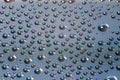 Many small water drops on the surface of cellphone hydriphobic coated glass screen