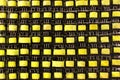 Many small yellow electrical ferrite transformers Royalty Free Stock Photo