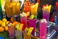 Many smoothie and drinks in plastic cups in Jalan Alor street food in the market Royalty Free Stock Photo