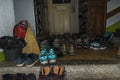 Many sneakers and mountain shoes in the corridor of the Kozya St