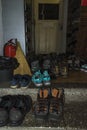 Many sneakers and mountain shoes in the corridor of the Kozya St