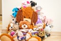 Many Soft plush fluffy toys sits in the children`s room Royalty Free Stock Photo